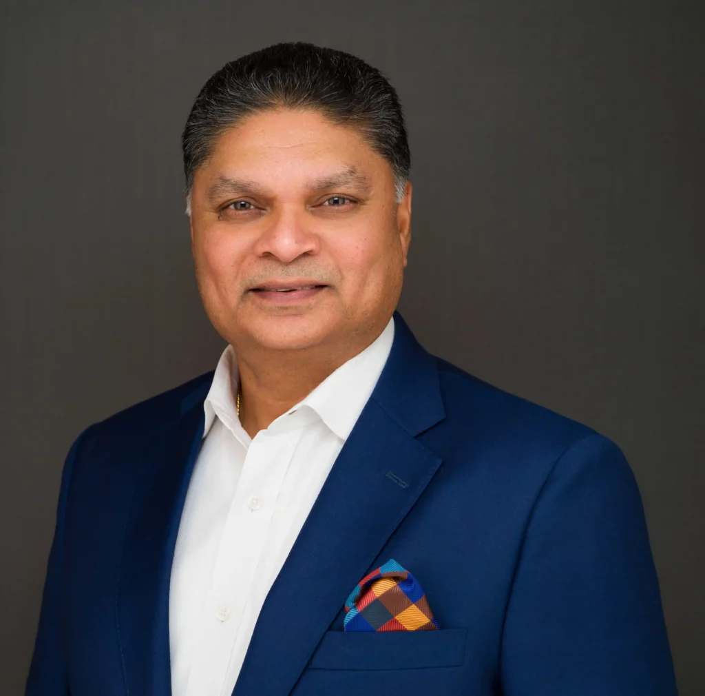 Headshot of a male in a blue suit by Headshot Specialist - Headshot Photographers NYC